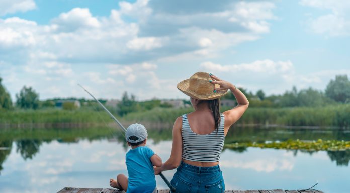 Woman and son fishing