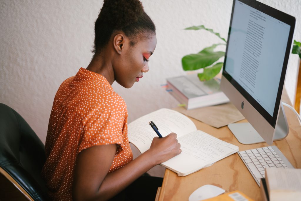 woman working in front of computer